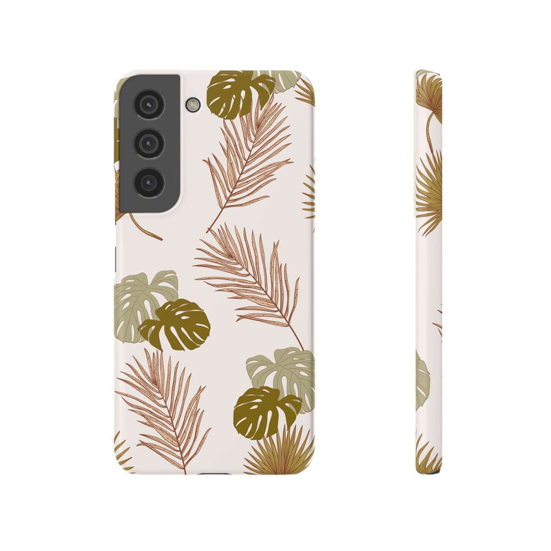 Nature-inspired mobile phone case with tropical leaf design, slim and durable polycarbonate, supports wireless charging.