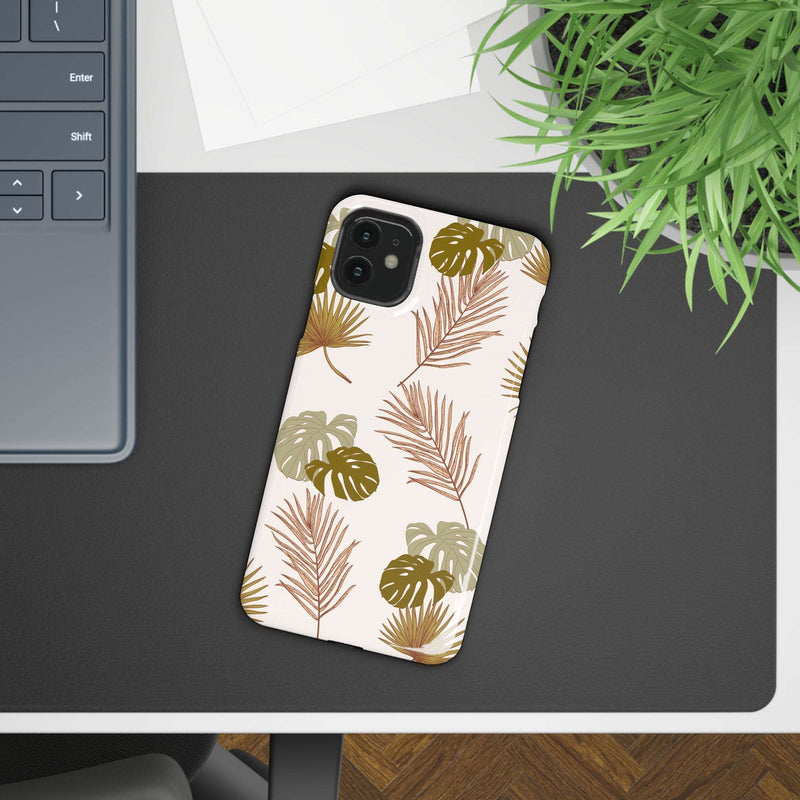 Nature-Inspired Mobile Phone Case with tropical leaf design; sleek, durable, polycarbonate protection; supports wireless charging; iPhone 16 compatible.