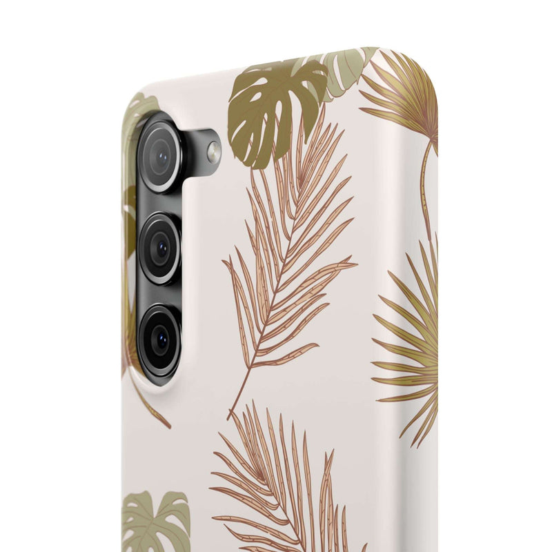 Nature-inspired mobile phone case with tropical leaf design, slim and durable, supports wireless charging.