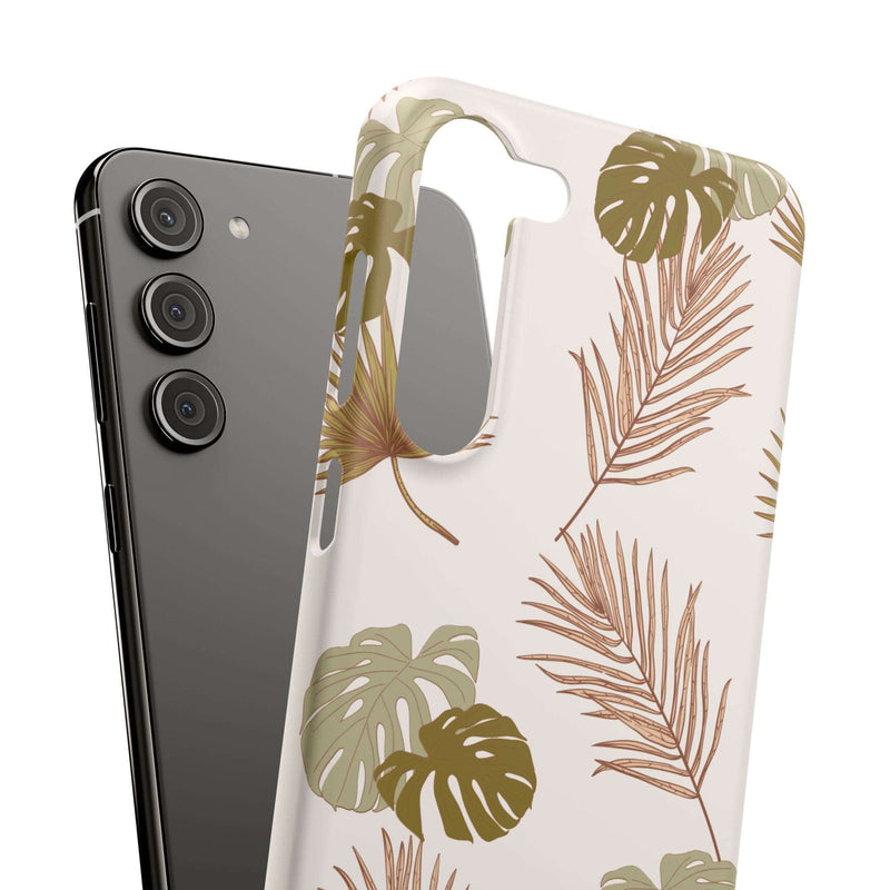 Nature-Inspired mobile phone case with tropical leaf design, slim polycarbonate, supports wireless charging, compatible with multiple models.