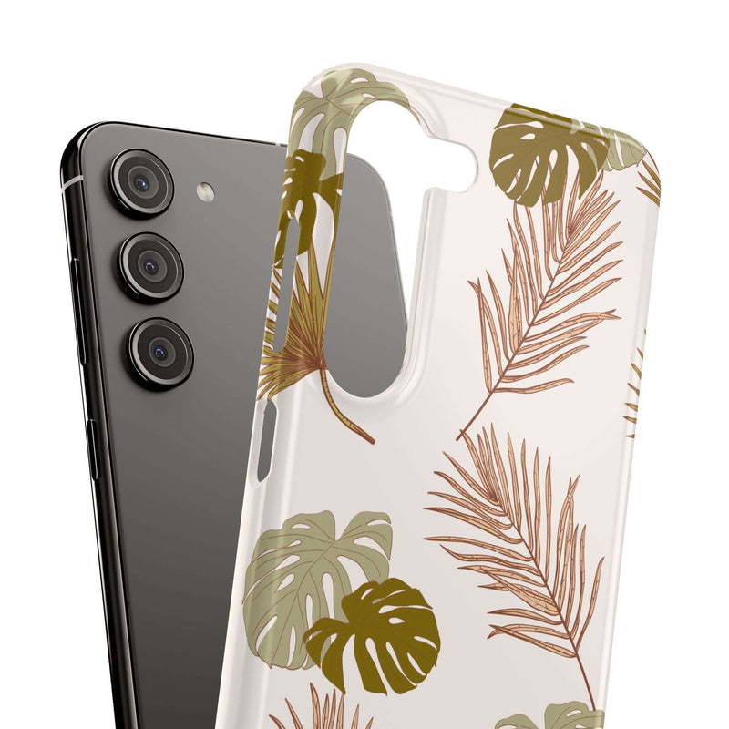 Nature-inspired mobile phone case with tropical leaf design, sleek and durable polycarbonate, supports wireless charging, available in matte or glossy finish.