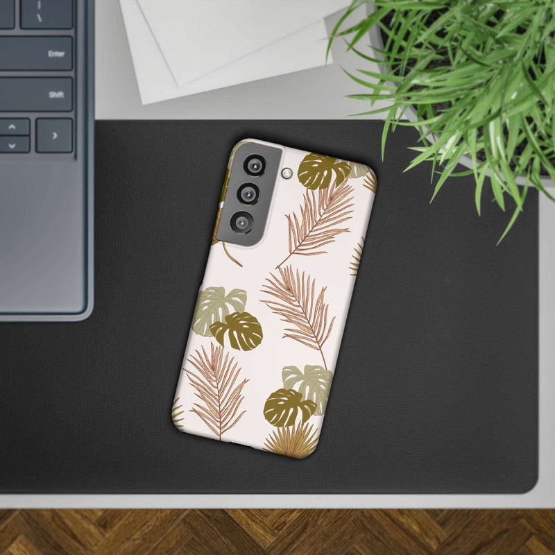 Nature-inspired mobile phone case with tropical leaf design, sleek and durable, perfect for iPhone 16 series, supports wireless charging.