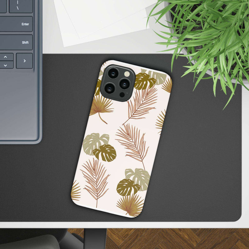 Nature-inspired mobile phone case with tropical leaf design, sleek and durable polycarbonate material, lightweight, supports wireless charging, available in matte or glossy finish.