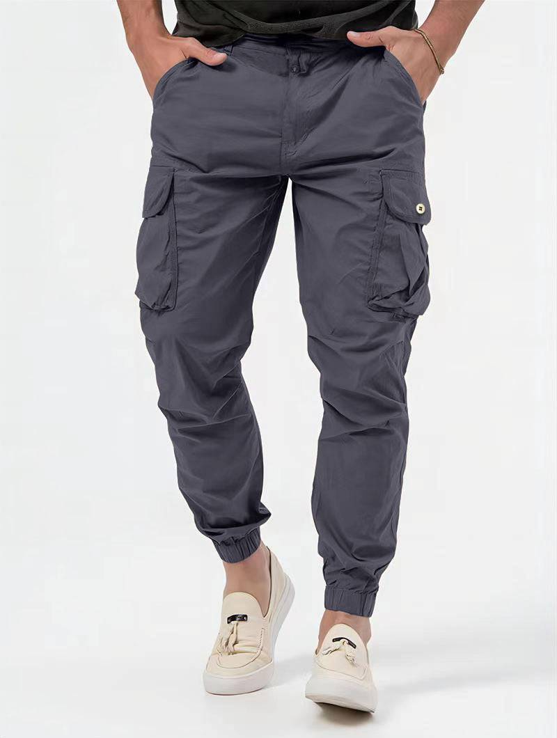 Men's stylish cargo trousers with 3D pockets and solid color design for casual and semi-formal wear.