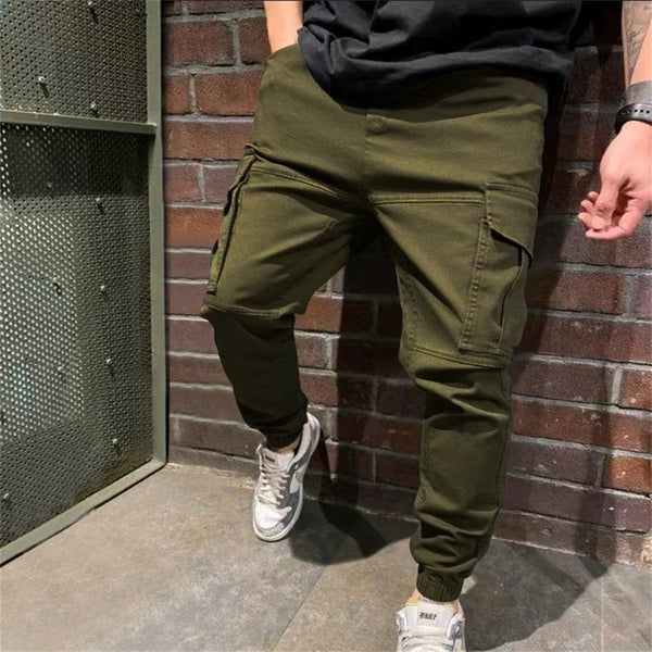 Men's cargo pants with multiple pockets in olive green, solid color, designed for durability and comfort.