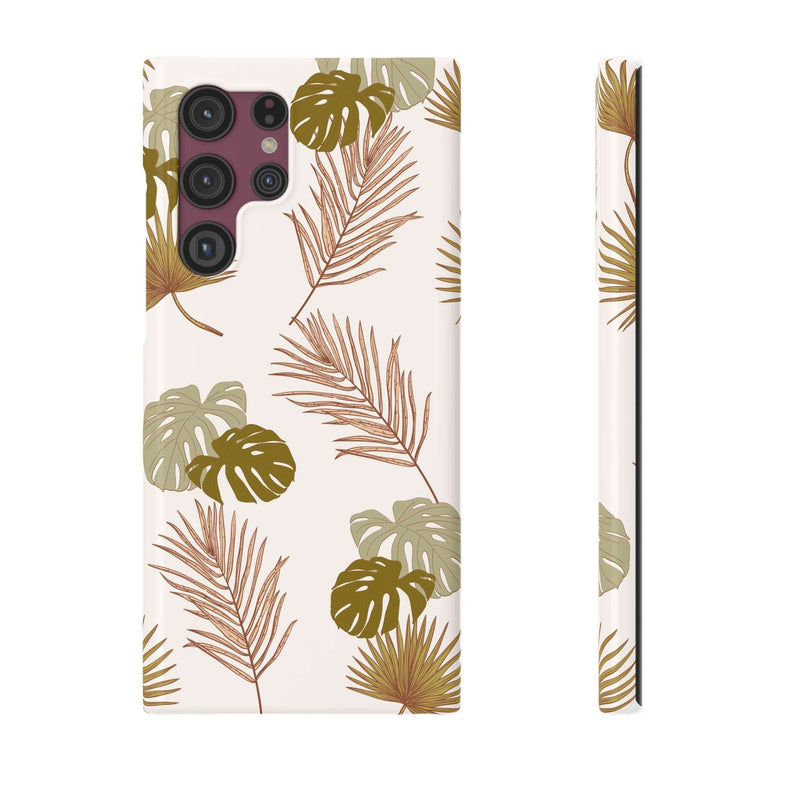 Nature-inspired mobile phone case with tropical leaf design, durable slim-fit polycarbonate, wireless charging support.