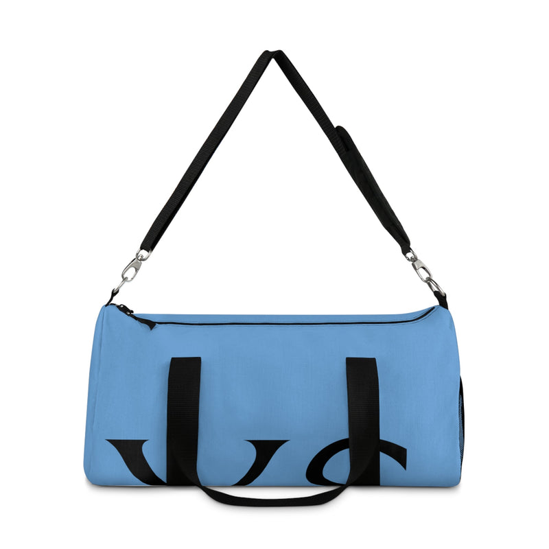 Stylish durable duffle bag in blue with black straps, perfect for travel adventures.