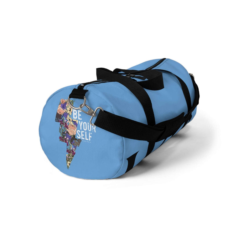 Duffle bag in vibrant blue with "Be Yourself" design, ideal for travel and gym use.