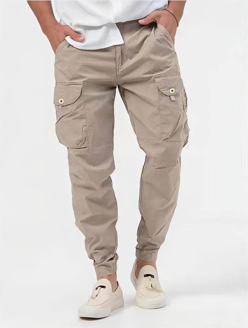 Men's stylish cargo trousers with innovative 3D pockets in solid color design.