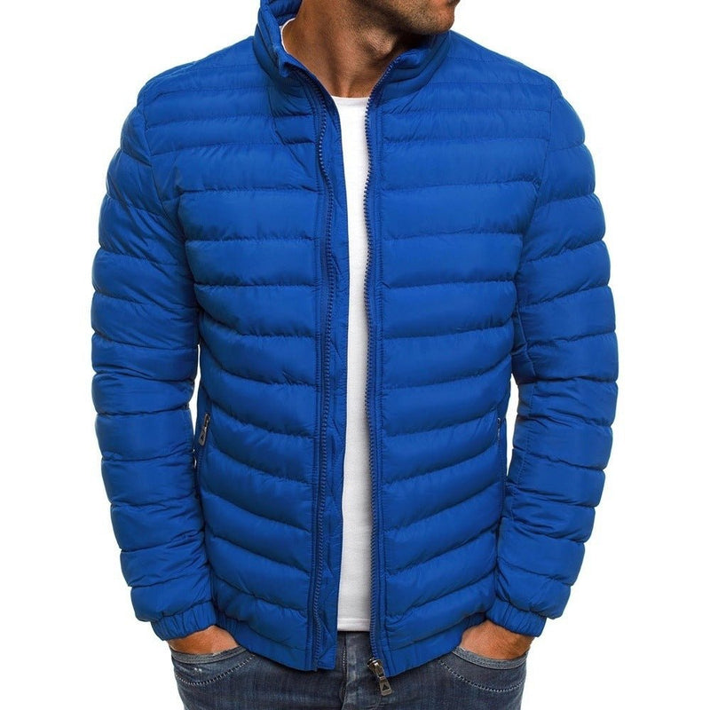 Men's insulated blue winter jacket with padded design and secure pockets.