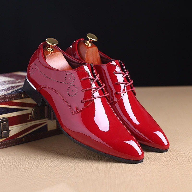 Men's formal red leather shoes for business and elegant wear.